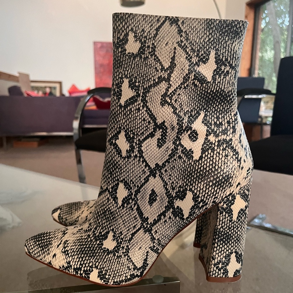 Snakeskin high heel booties